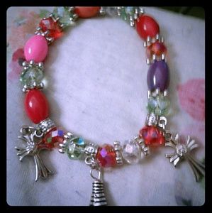 Bracelet with beads and 2 crosses